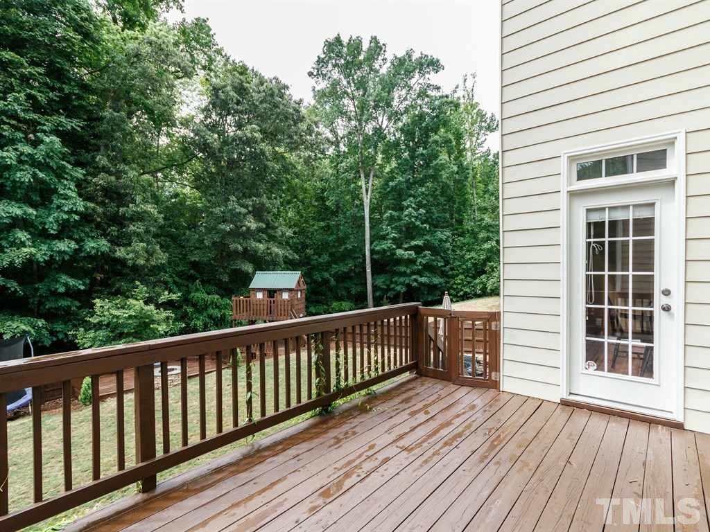 2233 Dunlin Lane Raleigh, NC 27614 - Photo 22 of 24 a view of a wooden deck
