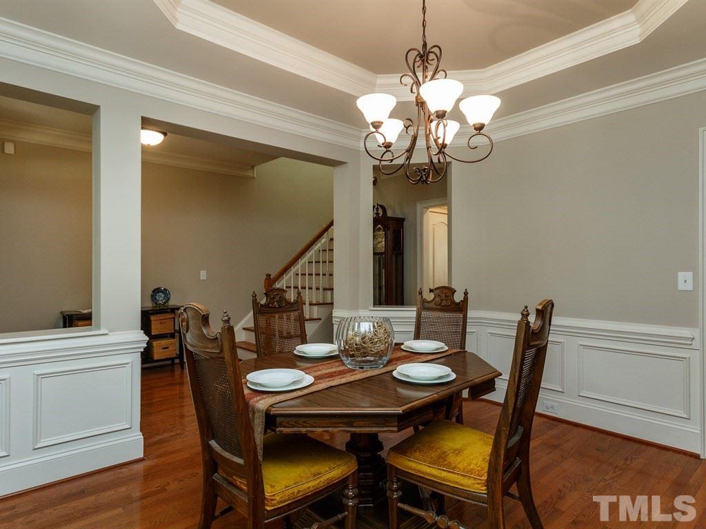 2233 Dunlin Lane Raleigh, NC 27614 - Photo 4 of 24 a view of a dining room with furniture and wooden floor