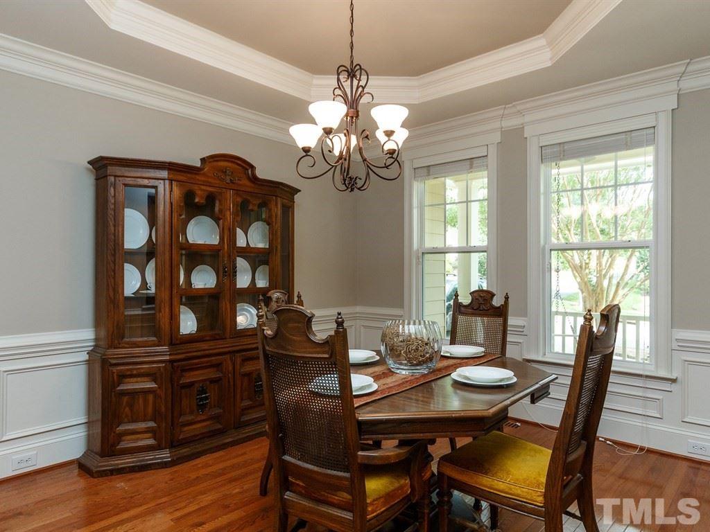 2233 Dunlin Lane Raleigh, NC 27614 - Photo 5 of 24 a view of a dining room with furniture window and wooden floor