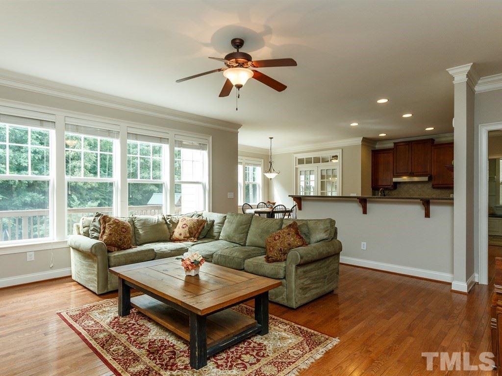 2233 Dunlin Lane Raleigh, NC 27614 - Photo 8 of 24 a living room with furniture and a large window