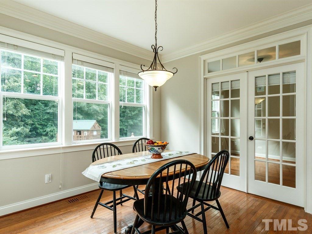 2233 Dunlin Lane Raleigh, NC 27614 - Photo 10 of 24 a view of a dining room with furniture window and wooden floor