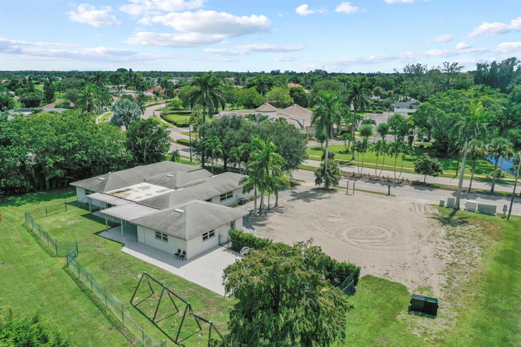 101 St Andrews Boulevard Naples, FL 34113 - Photo 22 of 34 an aerial view of a house with yard