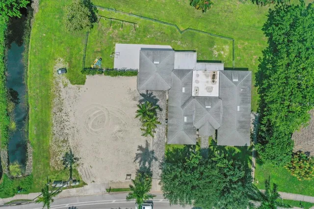 a view of a chair and table on the garden