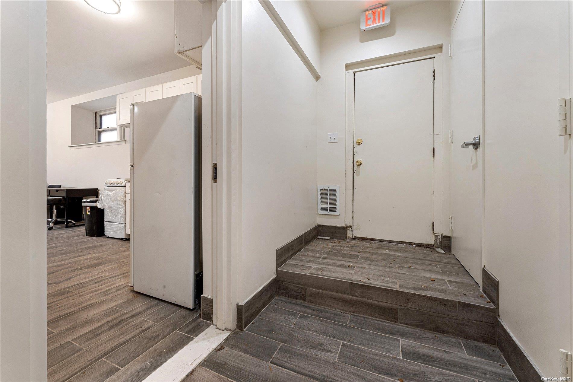 5112 Post Road Bronx, NY 10471 - Photo 22 of 35 a view of a hallway view with wooden floor and staircase