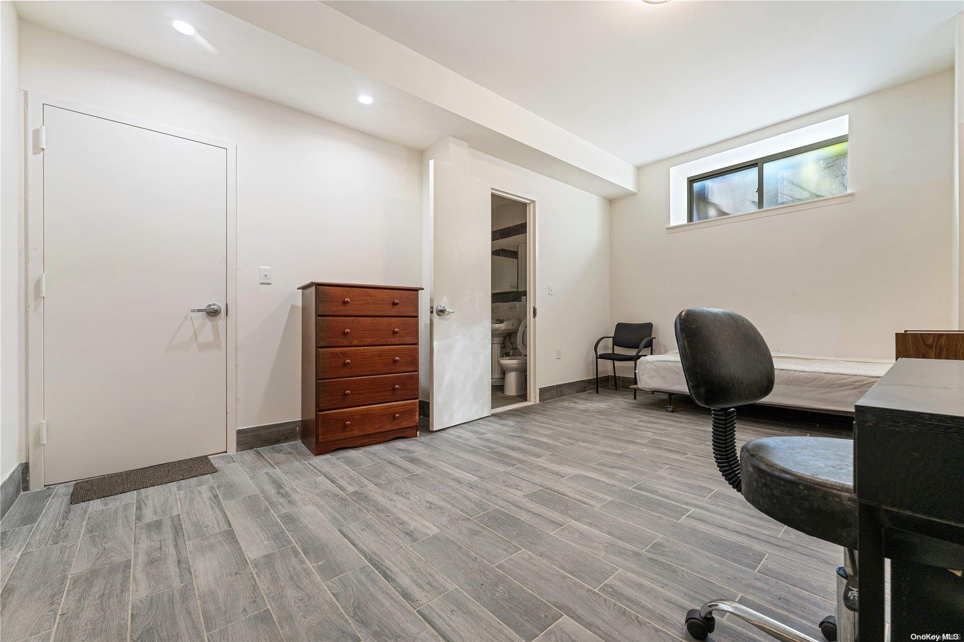 5112 Post Road Bronx, NY 10471 - Photo 25 of 35 a view of a livingroom with furniture and wooden floor