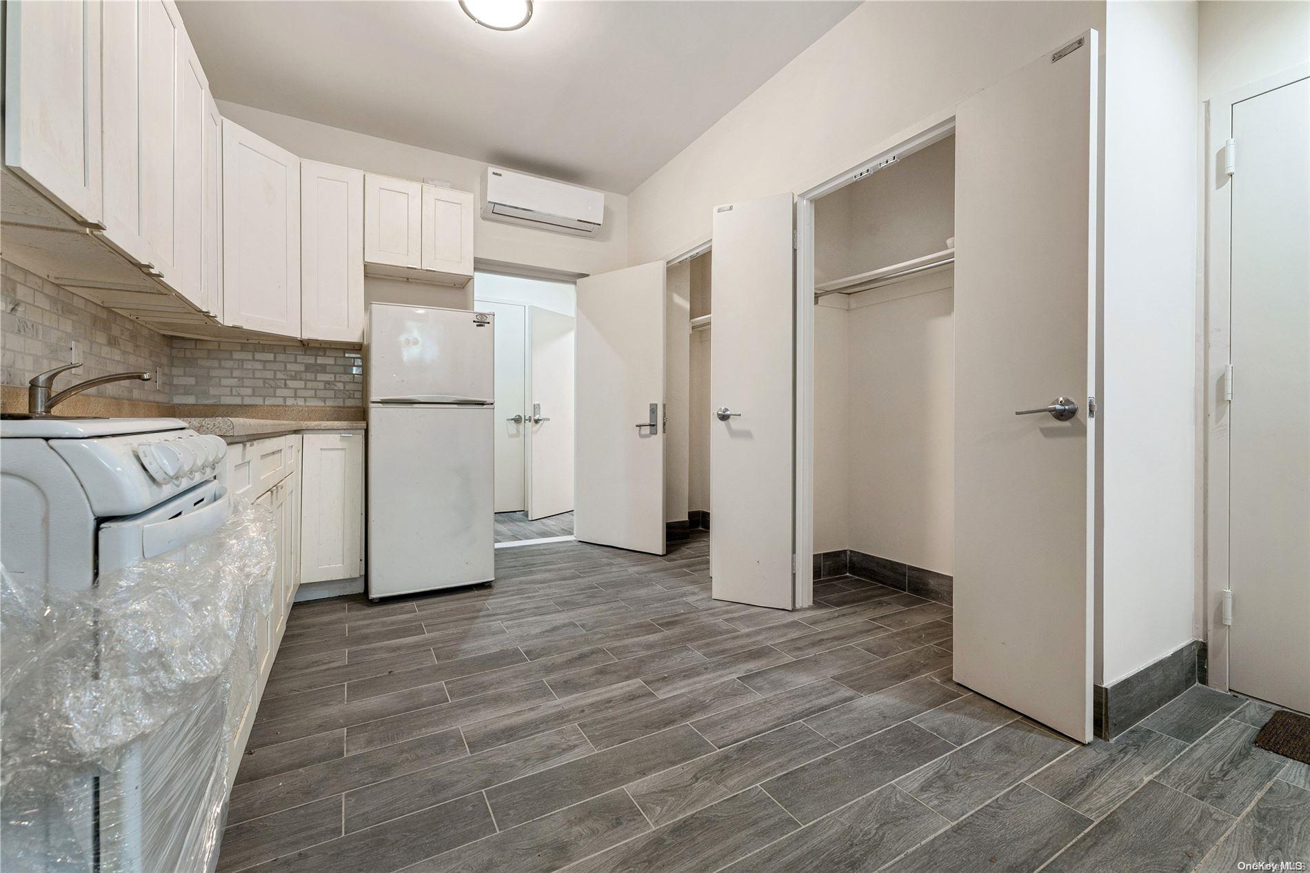 5112 Post Road Bronx, NY 10471 - Photo 28 of 35 a view of a kitchen with a sink and refrigerator