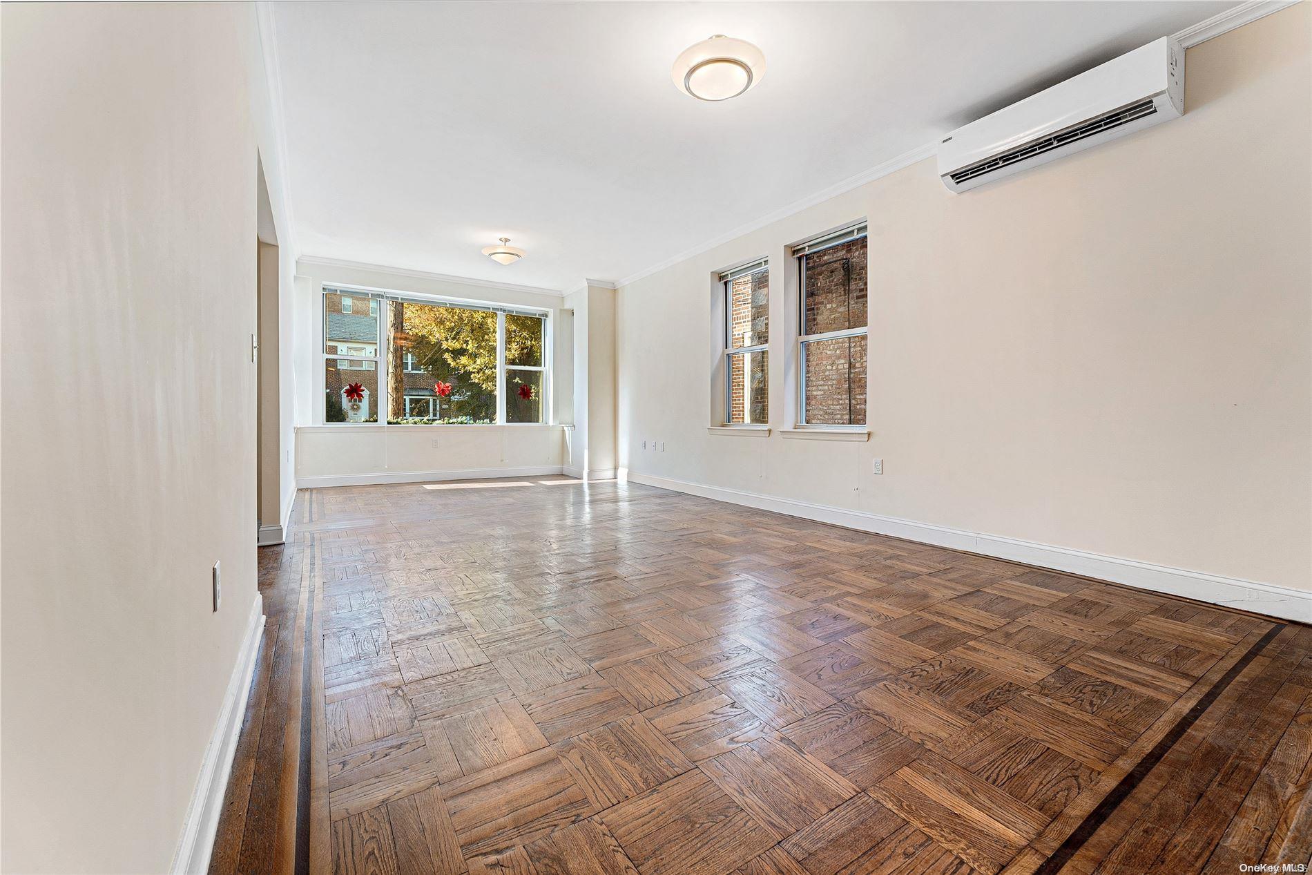 5112 Post Road Bronx, NY 10471 - Photo 5 of 35 an empty room with windows