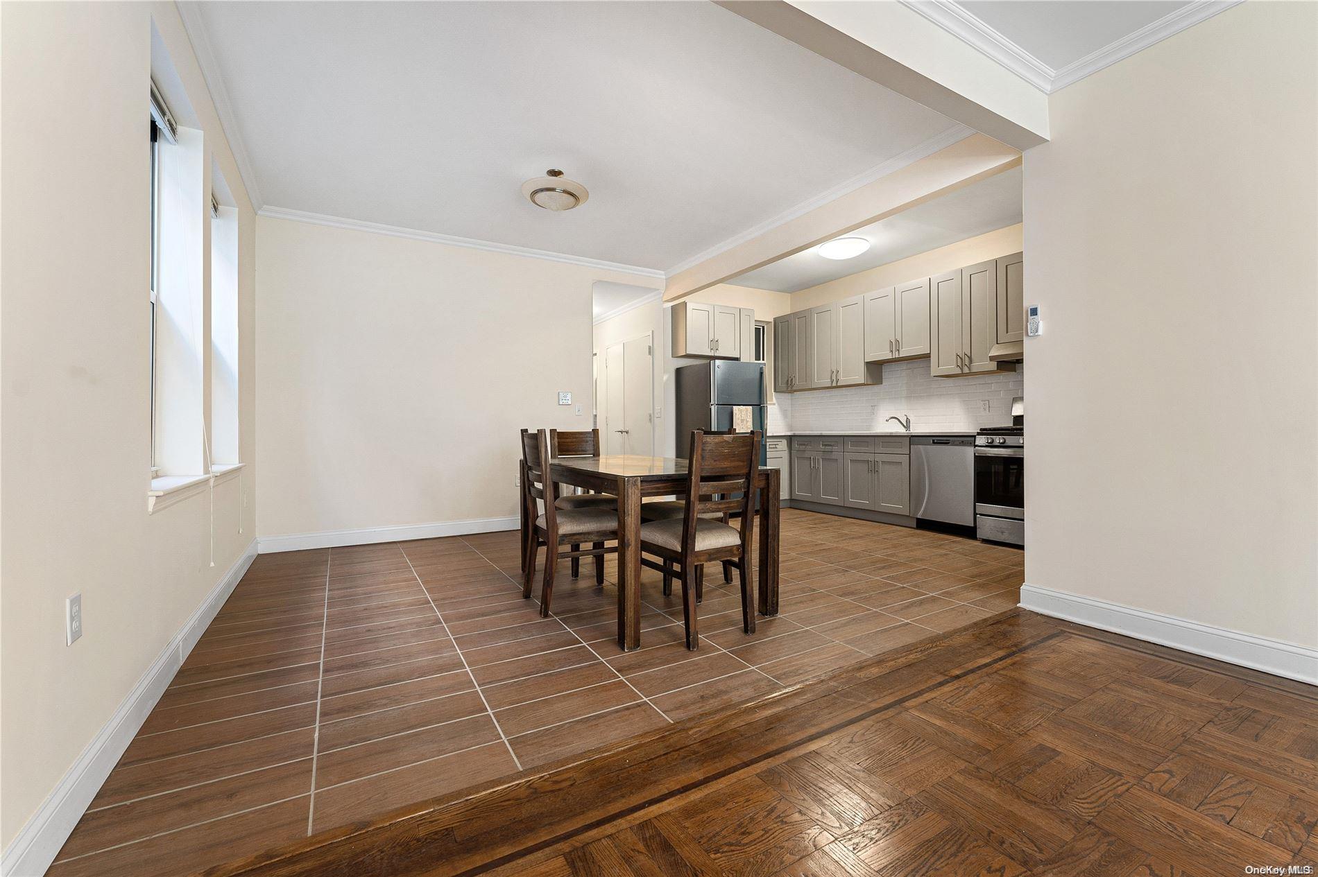 5112 Post Road Bronx, NY 10471 - Photo 7 of 35 a view of a dining room with furniture and chandelier