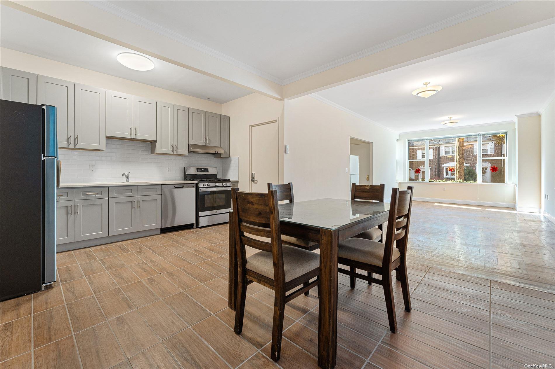 5112 Post Road Bronx, NY 10471 - Photo 10 of 35 a view of a dining room with furniture and wooden floor