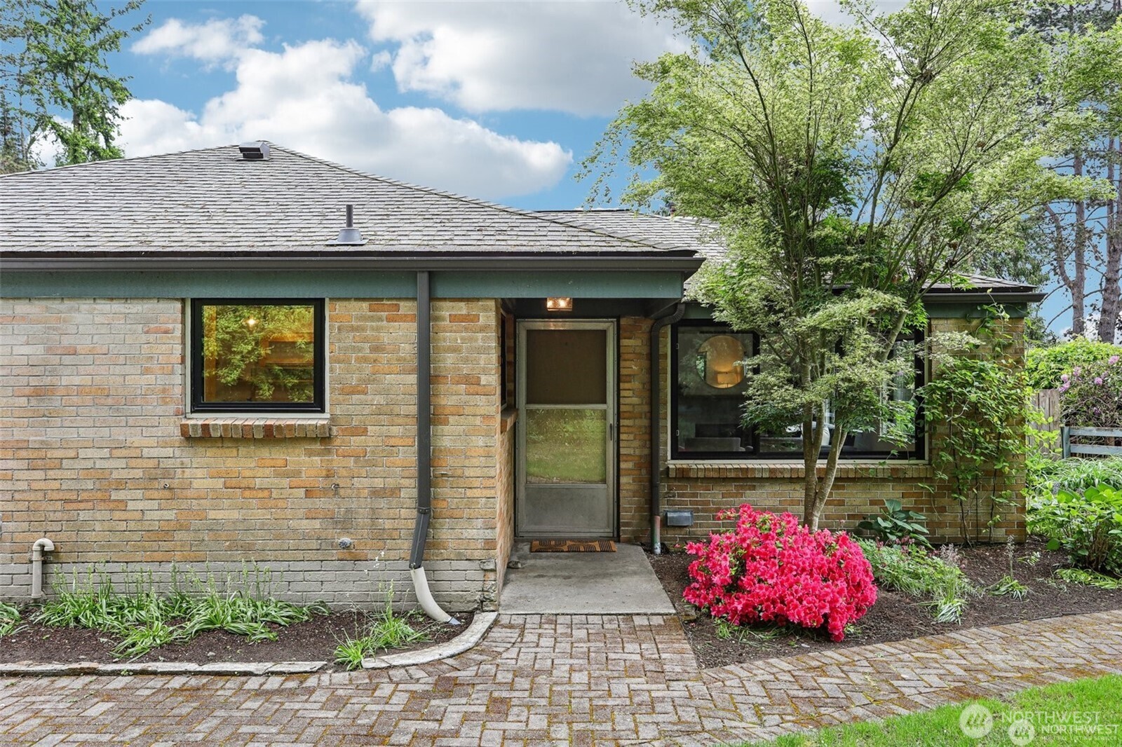 3532 Northeast 97th Street Seattle, WA 98115 - Photo 3 of 27 a front view of a house with outdoor space