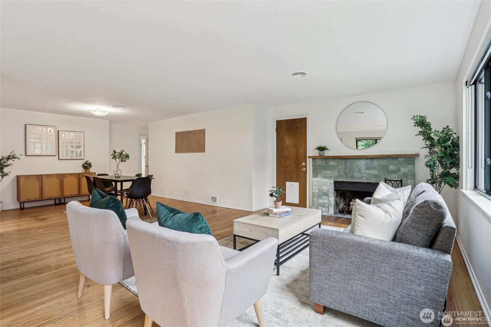 3532 Northeast 97th Street Seattle, WA 98115 - Photo 5 of 27 a living room with furniture and a fireplace