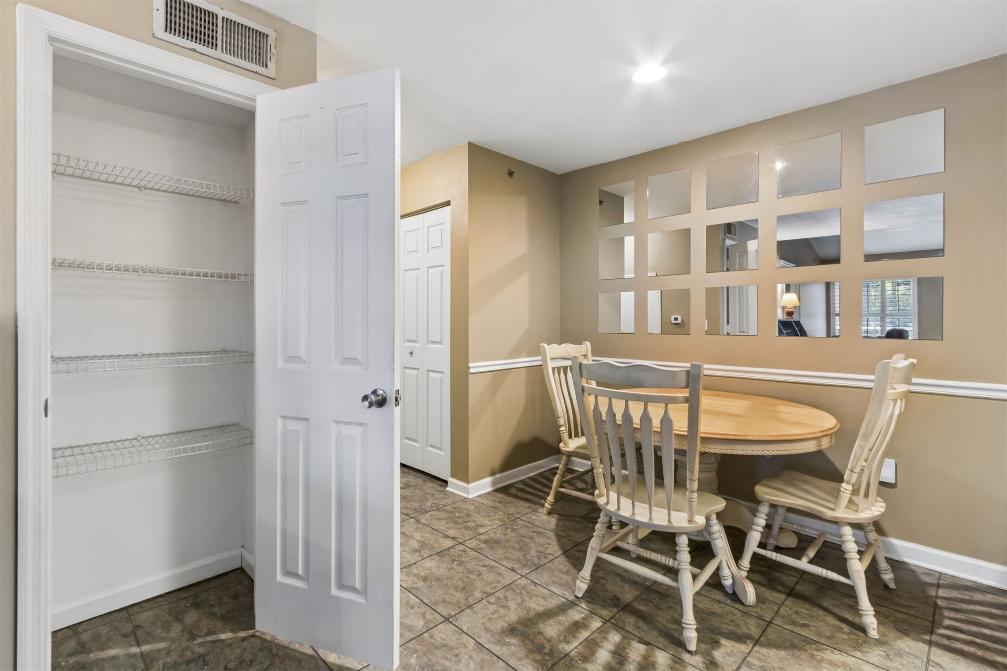 23583 Bahama Point, Unit 1526 Fernandina Beach, FL 32034 - Photo 23 of 43 Storage closet and dining area