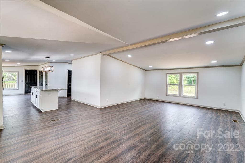 1569 Lawrence Road Clover, SC 29710 - Photo 6 of 26 a view of a living room a kitchen and a wooden floor