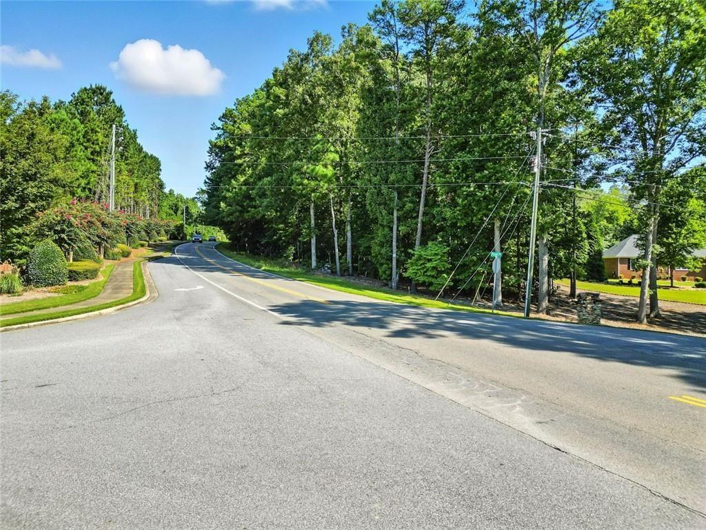 0 Fate Conn Road Canton, GA 30114 - Photo 6 of 12 a view of a road with a houses