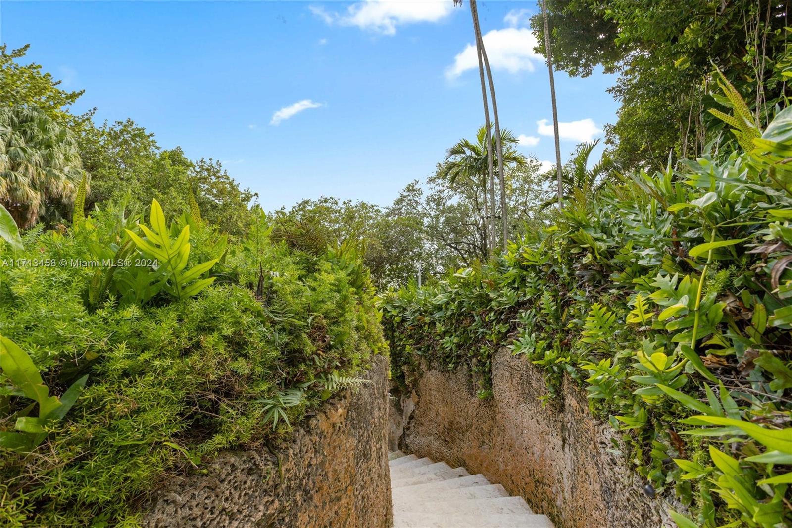 2127 Brickell Avenue, Unit 2804 Miami, FL 33129 - Photo 51 of 72 a backyard of a house with lots of green space