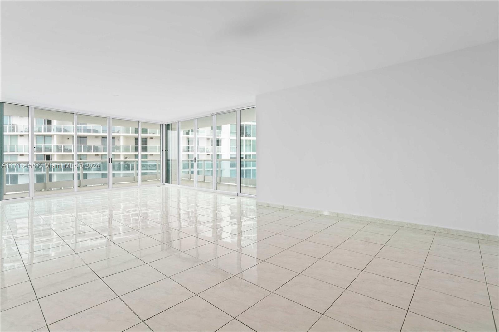2127 Brickell Avenue, Unit 2804 Miami, FL 33129 - Photo 6 of 72 a view of an empty room and window