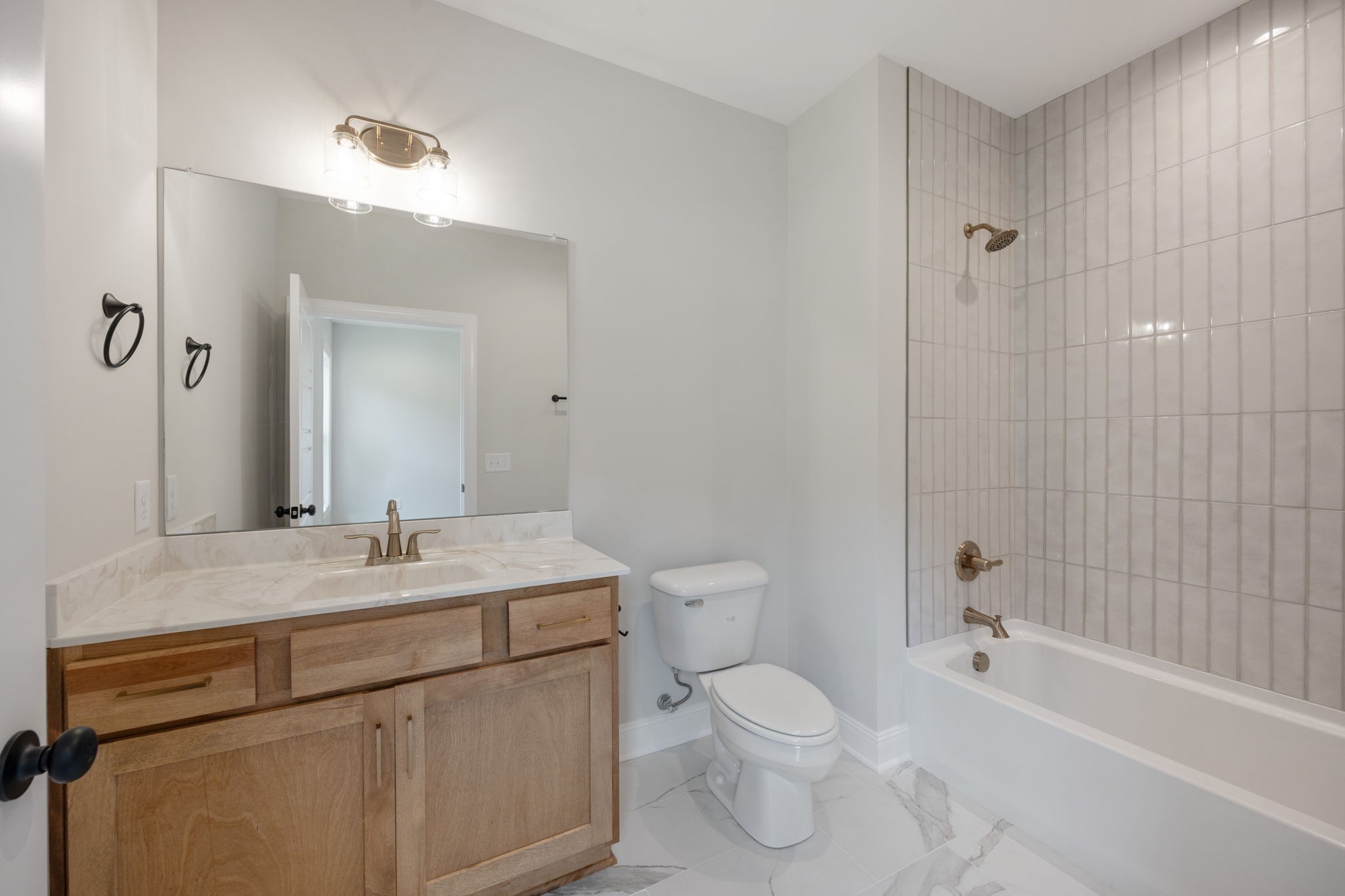 2009 Rylee Way, Unit 22 Greenbrier, TN 37073 - Photo 19 of 28 a bathroom with a sink a toilet and shower