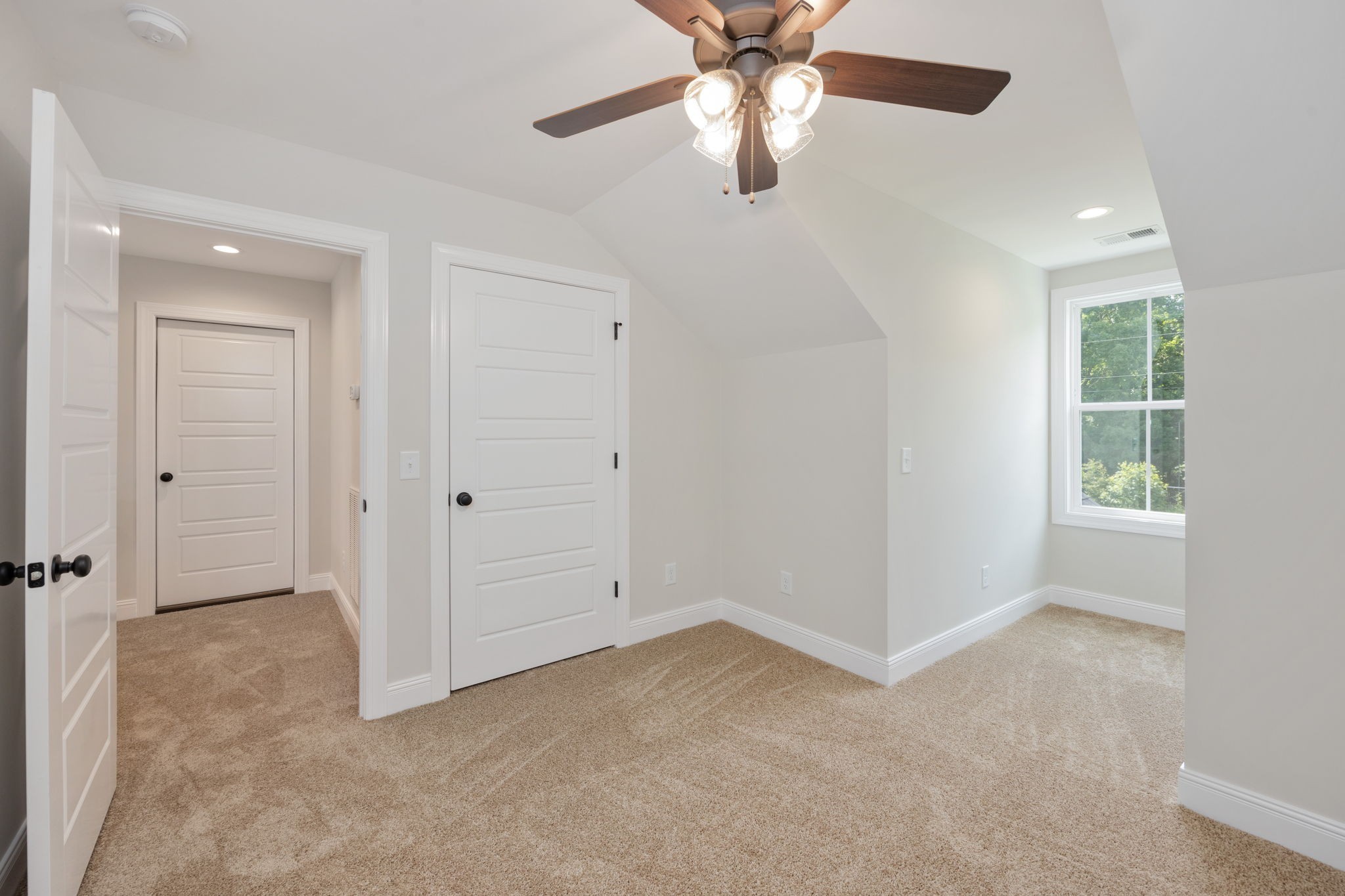2009 Rylee Way, Unit 22 Greenbrier, TN 37073 - Photo 21 of 28 an empty room with windows and fan