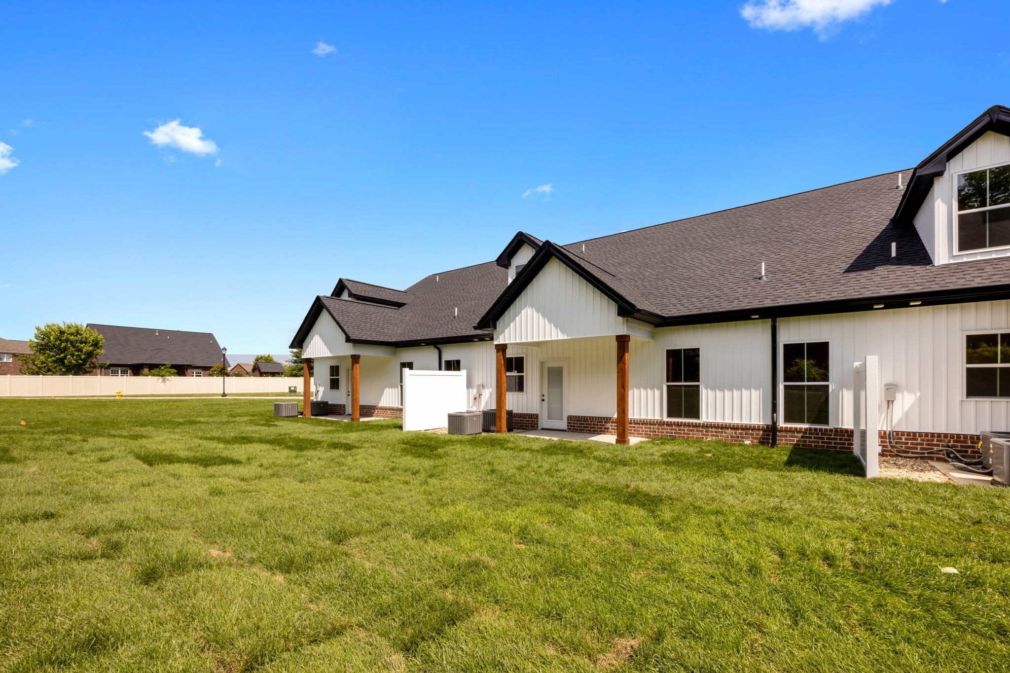 2009 Rylee Way, Unit 22 Greenbrier, TN 37073 - Photo 28 of 28 a front view of a house with a yard