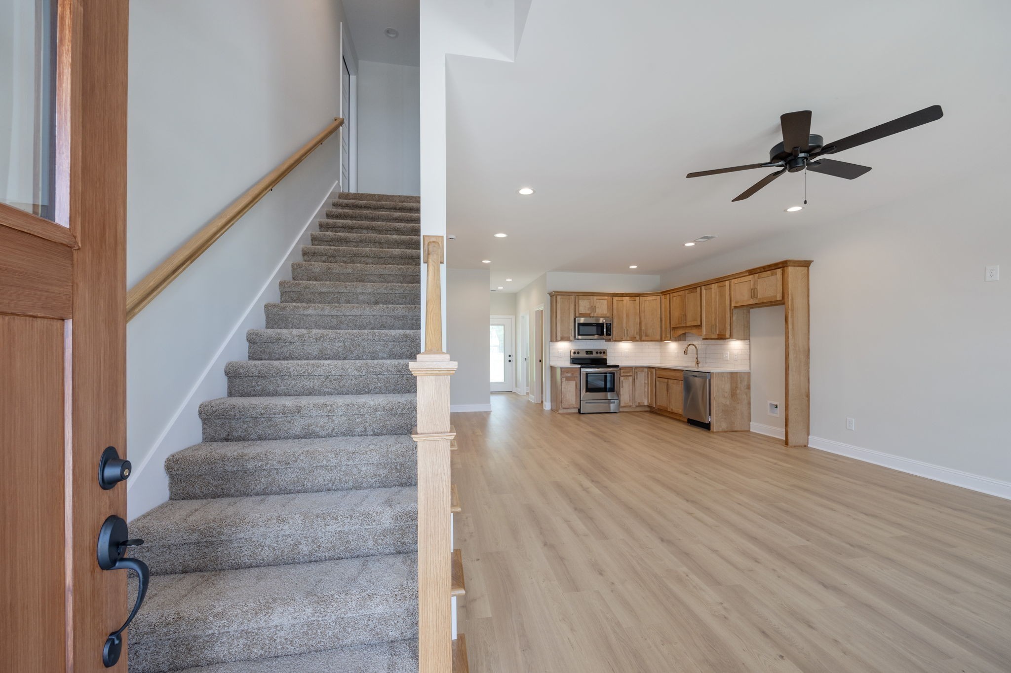 2009 Rylee Way, Unit 22 Greenbrier, TN 37073 - Photo 7 of 28 a view of a livingroom with furniture and stairs