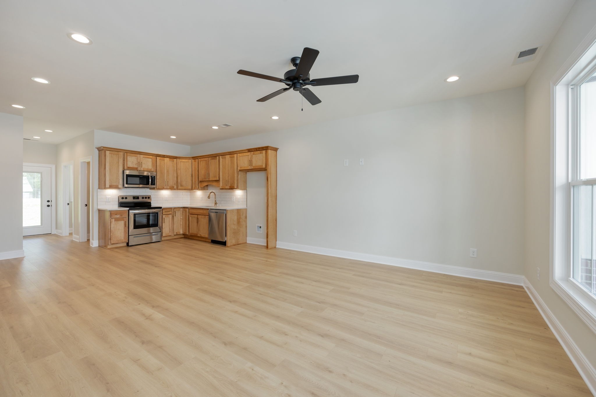 2009 Rylee Way, Unit 22 Greenbrier, TN 37073 - Photo 8 of 28 a view of a kitchen with a sink and cabinets