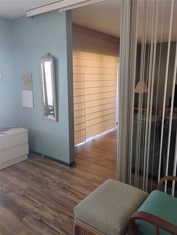 a view of a room with windows