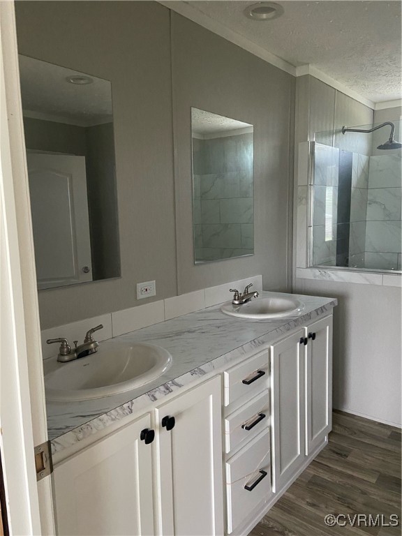 18 Smith Street Dendron, VA 23839 - Photo 3 of 10 a bathroom with a granite countertop sink and a mirror