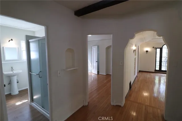 a view of a hallway view with staircase