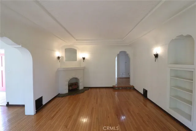 a view of a livingroom with wooden floor