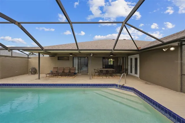 an aerial view of houses with outdoor space