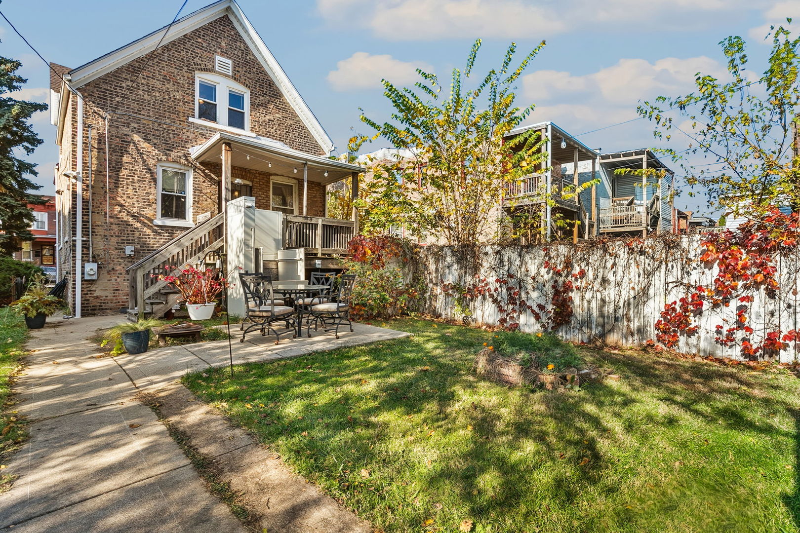 7127 South St Lawrence Avenue Chicago, IL 60619 - Photo 21 of 26 front view of a house with a yard