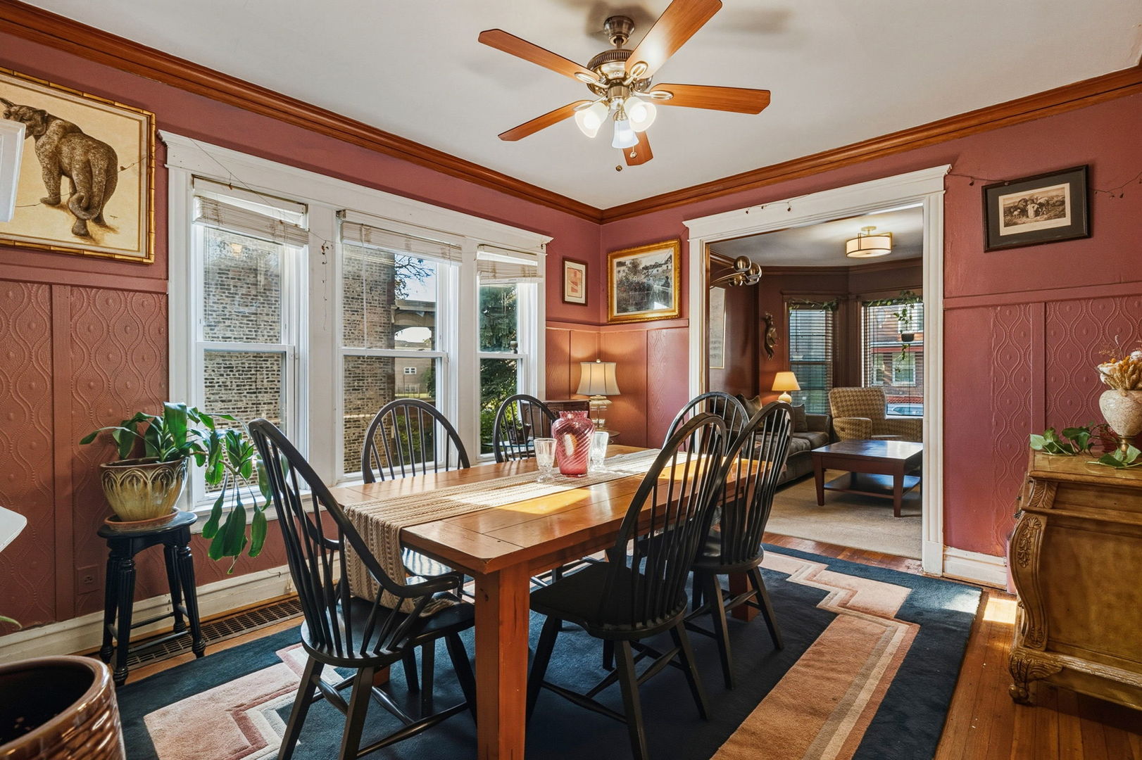 7127 South St Lawrence Avenue Chicago, IL 60619 - Photo 5 of 26 a view of a dining room with furniture window and wooden floor