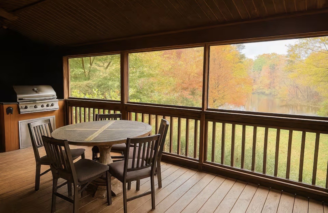 298 Eagle Lake Road Coalmont, TN 37313 - Photo 21 of 38 a view of a dining room with furniture window and wooden floor