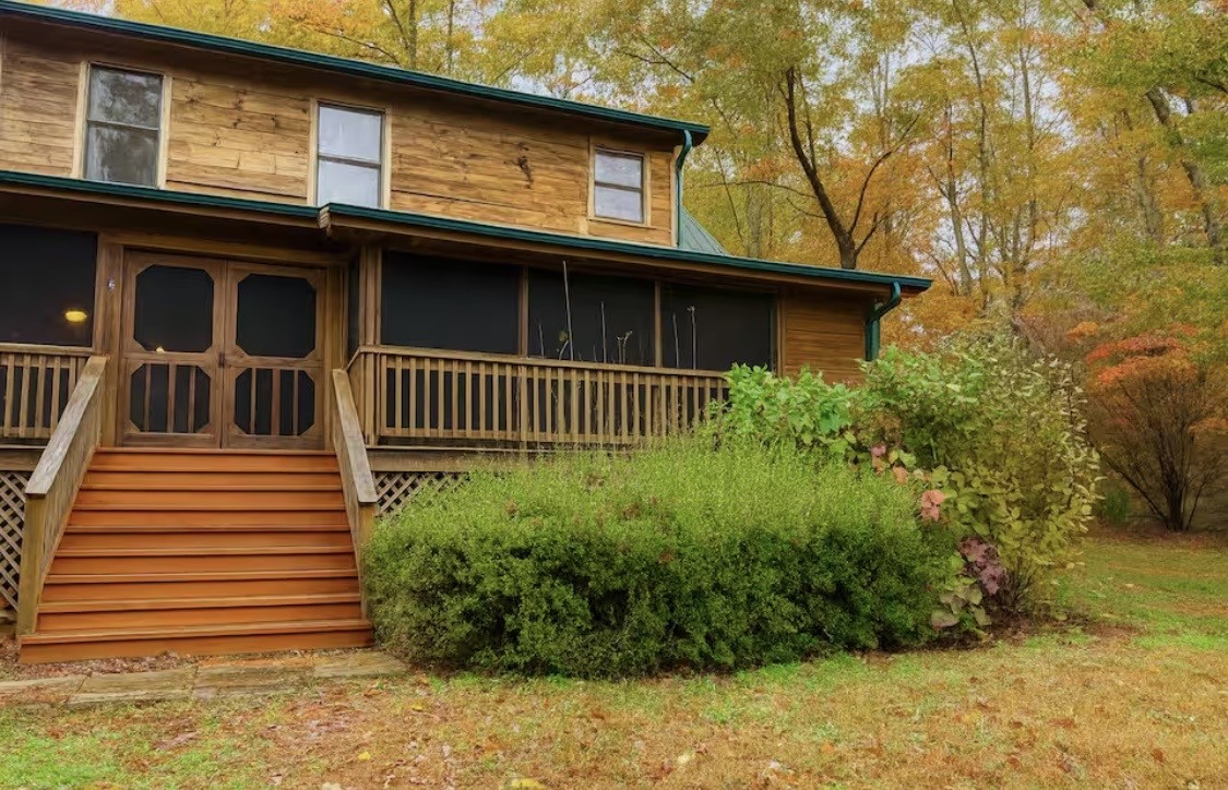 298 Eagle Lake Road Coalmont, TN 37313 - Photo 24 of 38 a front view of a house with a yard