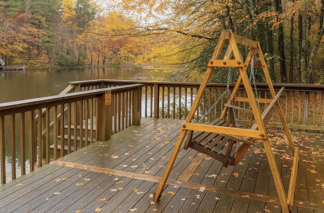 298 Eagle Lake Road Coalmont, TN 37313 - Photo 29 of 38 a view of a wooden deck with a lake view