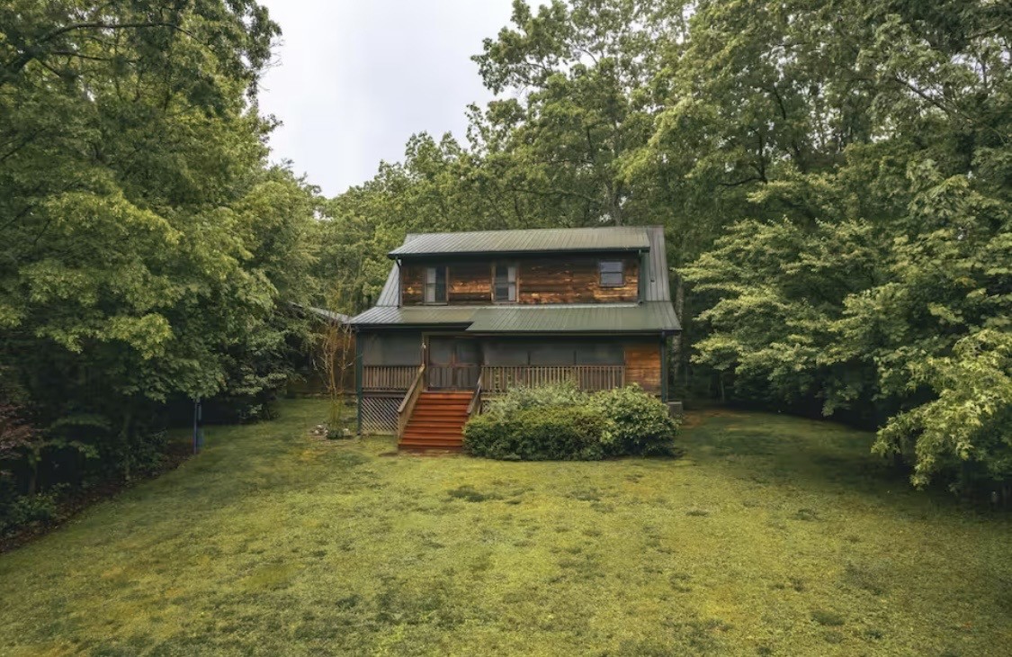 298 Eagle Lake Road Coalmont, TN 37313 - Photo 31 of 38 a view of a house with a yard