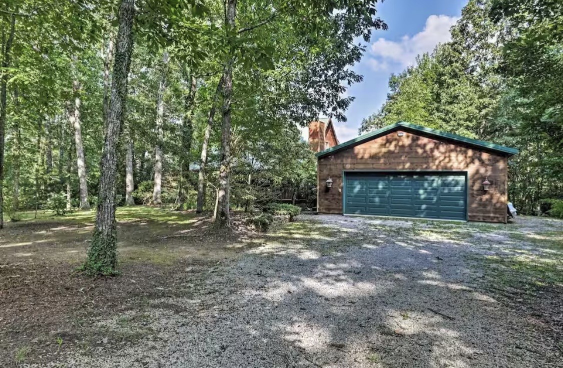 298 Eagle Lake Road Coalmont, TN 37313 - Photo 37 of 38 a view of a yard with large trees