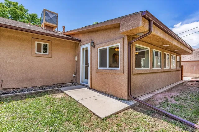 a front view of a house with an outdoor space