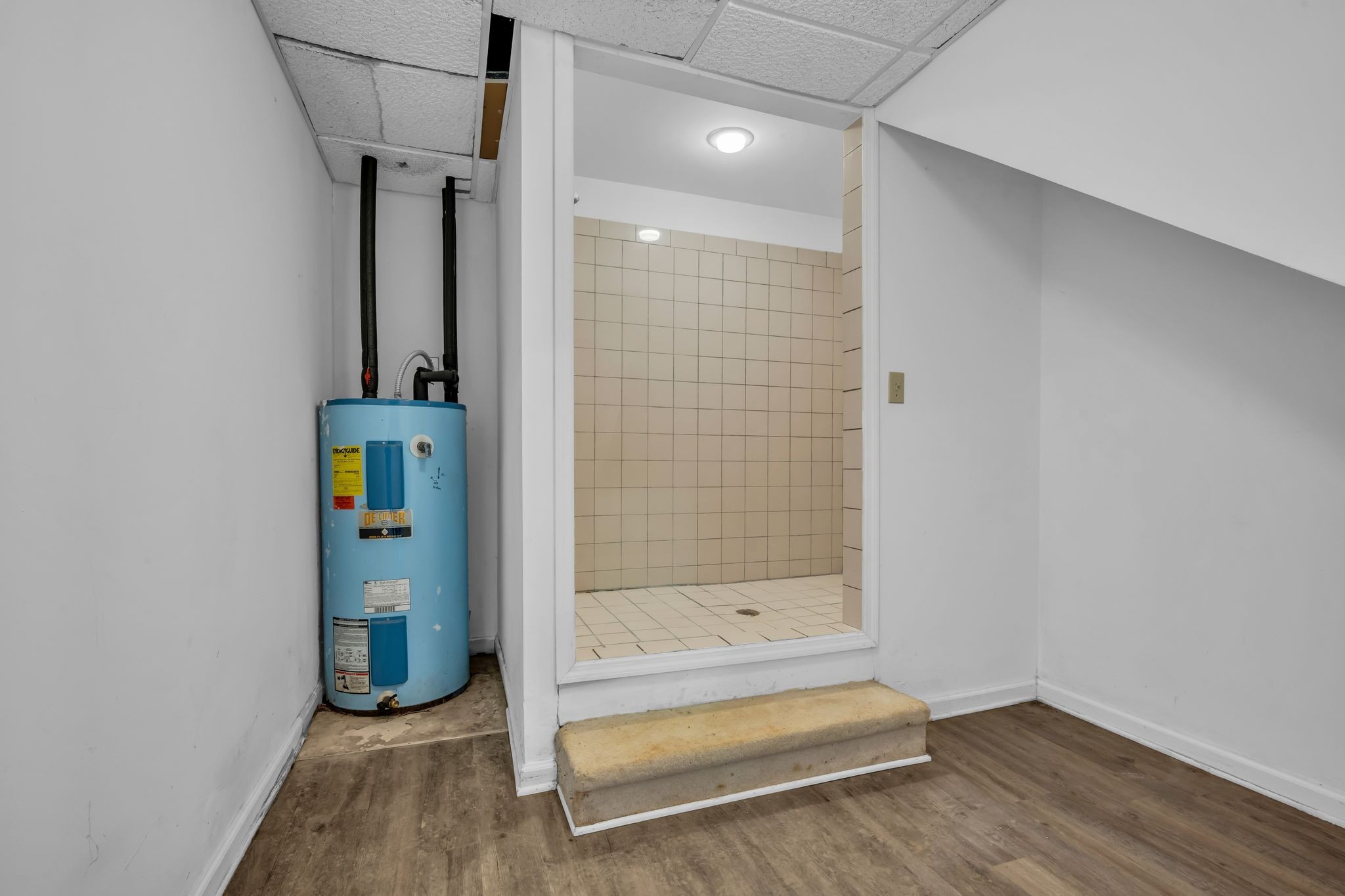 2340 Ridge Road McEwen, TN 37101 - Photo 64 of 72 a bathroom with a bathtub and a shower