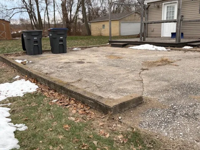 a house with trees in the background