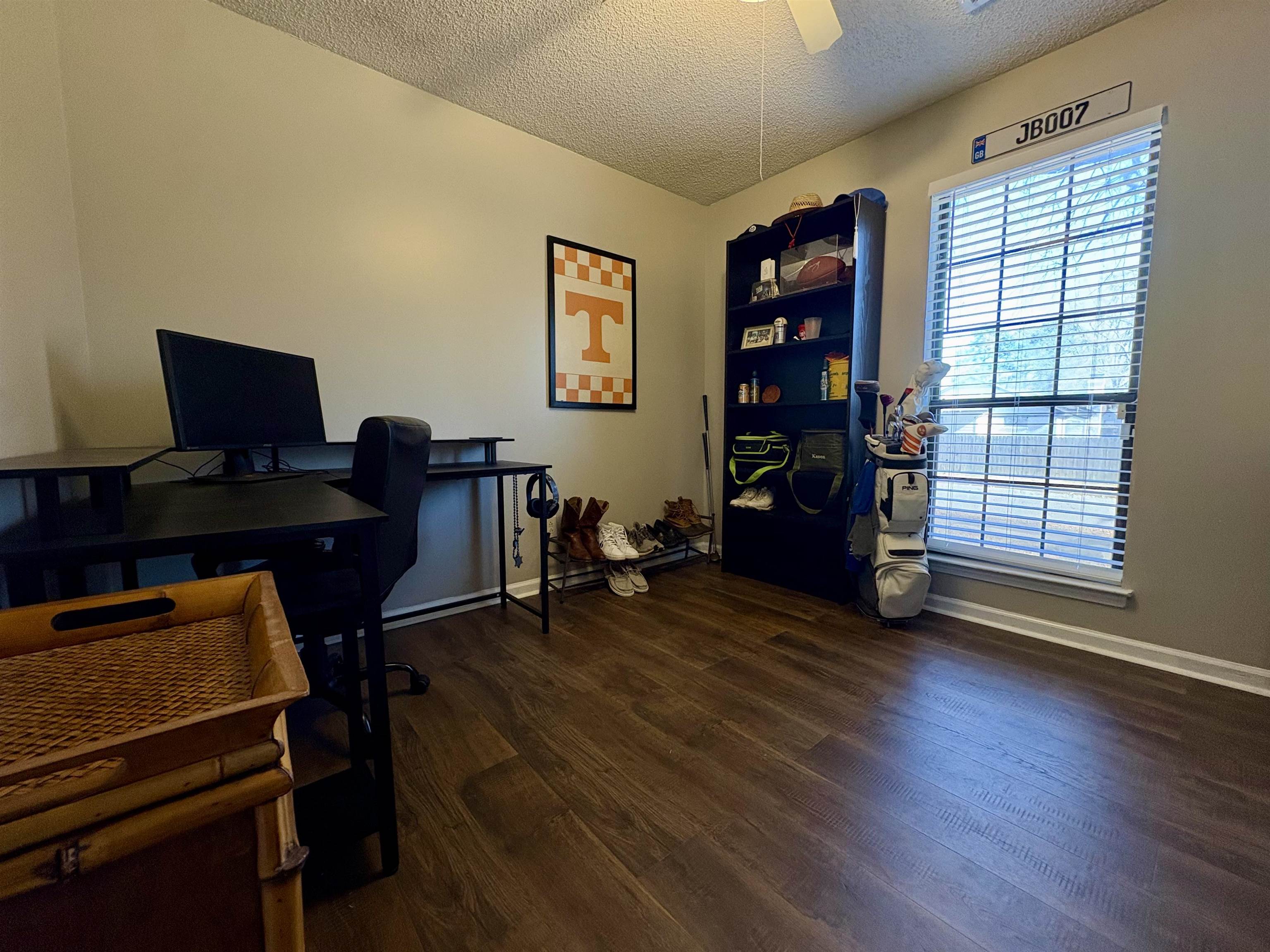 3507 Chowning Road Memphis, TN 38135 - Photo 11 of 17 Home office with a textured ceiling, dark wood-style floors, and ceiling fan