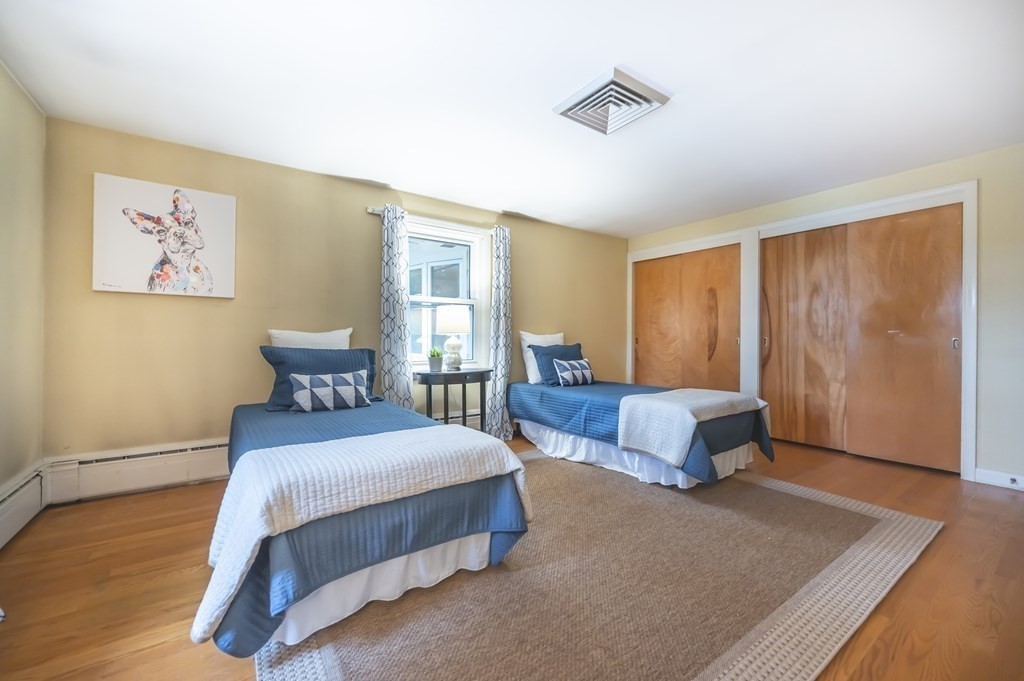 68 High Plain Road Andover, MA 01810 - Photo 20 of 33 a bedroom with a bed and window