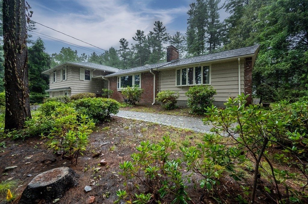 68 High Plain Road Andover, MA 01810 - Photo 2 of 33 a front view of house with yard and green space