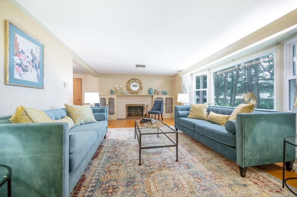 68 High Plain Road Andover, MA 01810 - Photo 4 of 33 a living room with furniture and a fireplace