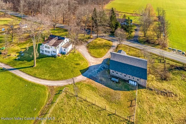 a view of swimming pool with seating area