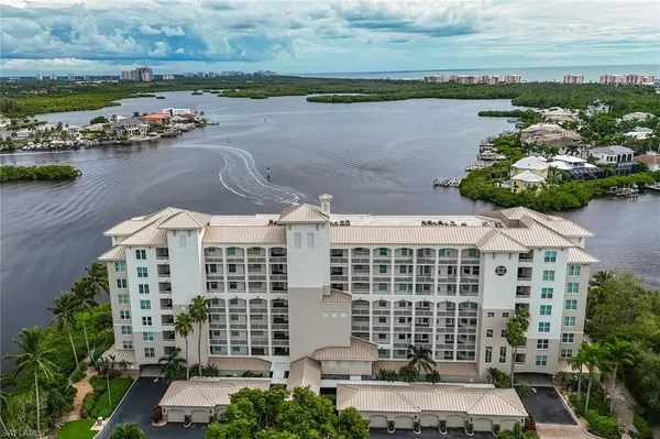 a view of a lake with building in front of it