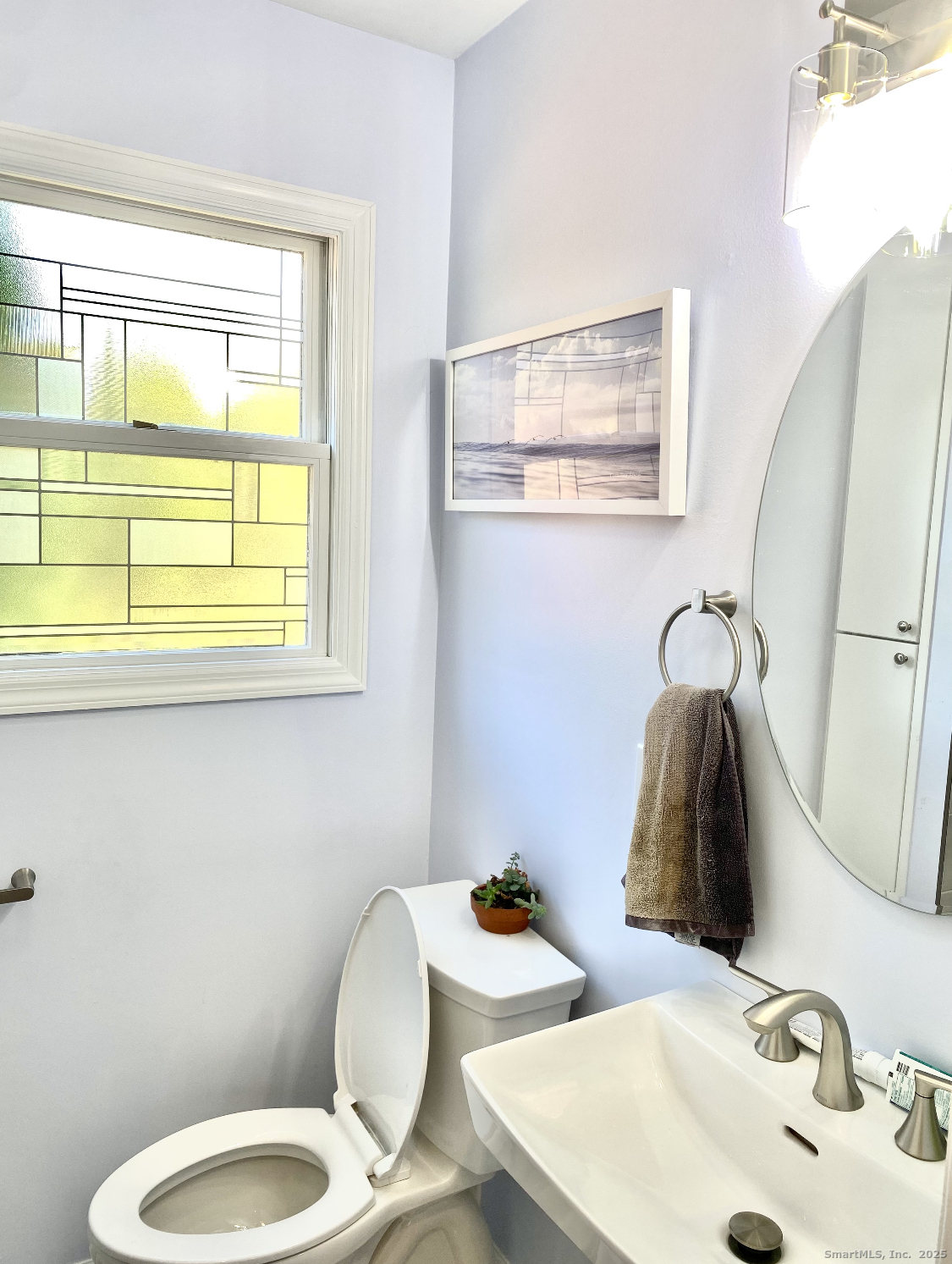 37 Newfane Road New Fairfield, CT 06812 - Photo 11 of 13 a bathroom with a sink and a mirror