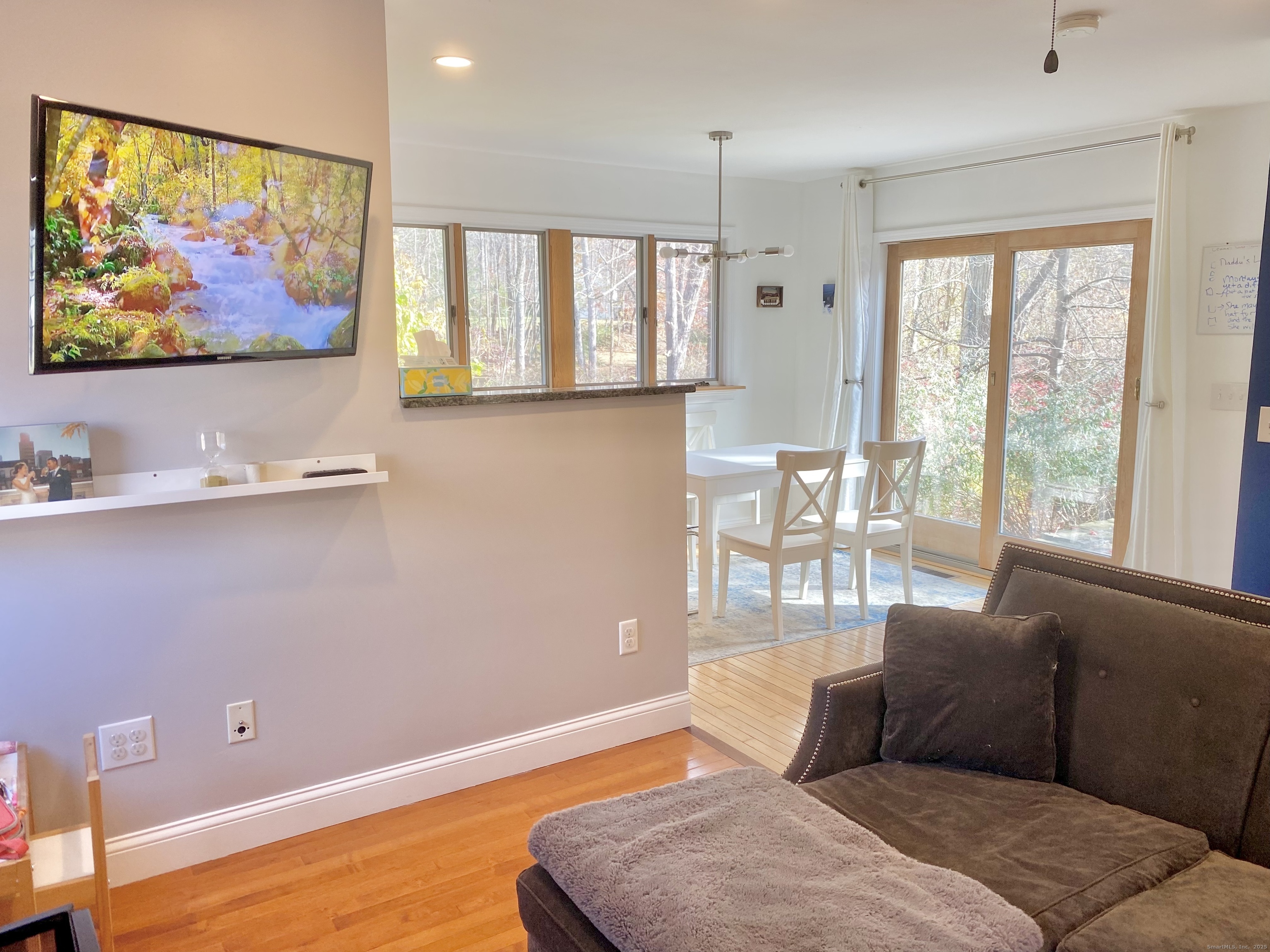 37 Newfane Road New Fairfield, CT 06812 - Photo 2 of 13 a living room with furniture and a flat screen tv