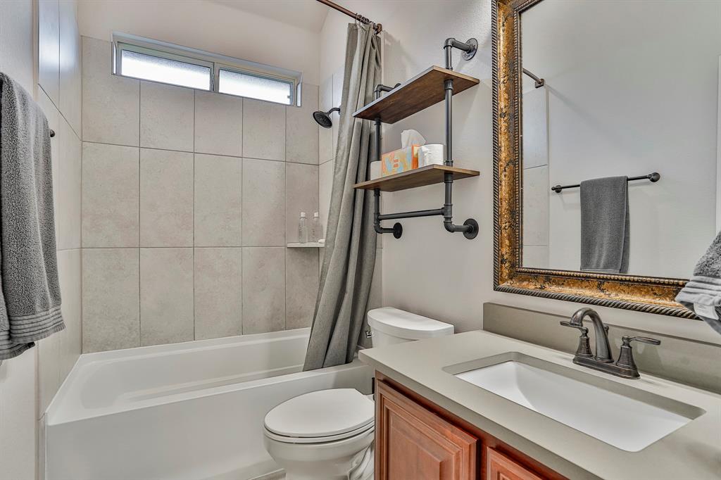 2425 Turning Leaf Lane Midlothian, TX 76065 - Photo 12 of 29 Full bath featuring vanity and shower / tub combo with curtain