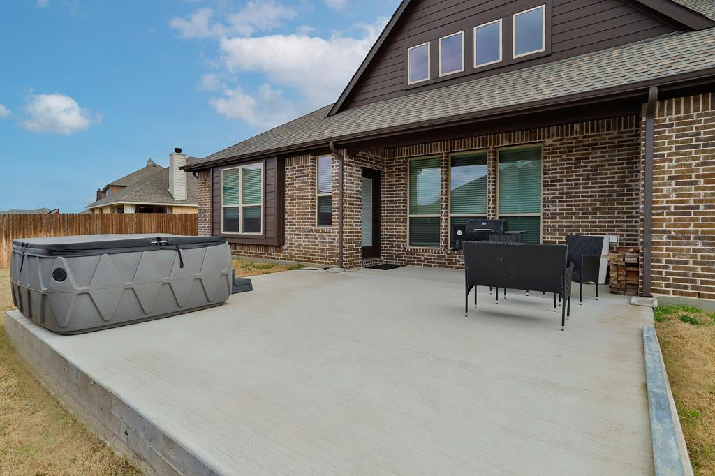 2425 Turning Leaf Lane Midlothian, TX 76065 - Photo 28 of 29 View of patio featuring a hot tub and outdoor dining space